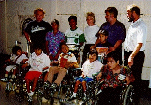 (Photo of VINE team and Lopez children)